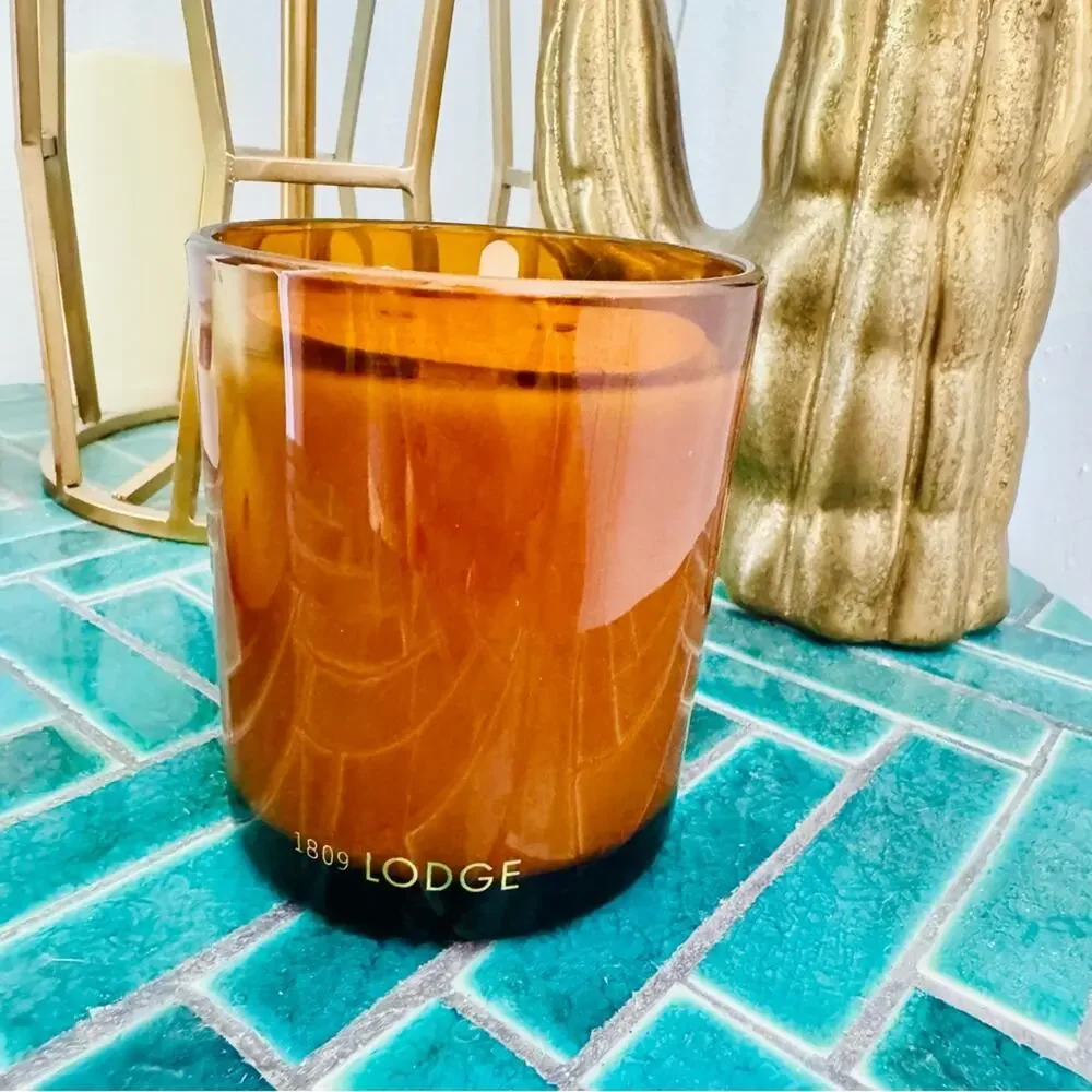 NEW FP FREE PEOPLE Amber Rust Glass Vessel Lodge Palo Santo $48 Scented Candle